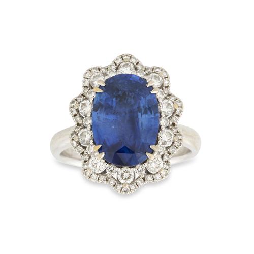 87 · 18CT WHITE GOLD SAPPHIRE AND DIAMOND RING