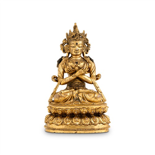 76 · A SINO-TIBETAN GILT BRONZE SEATED VAJRASATTVA