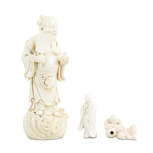 73 · A GROUP OF THREE DEHUA-STYLE PORCELAIN FIGURES OF BODHISATTVAS Please see important information below regarding collection of lots i...