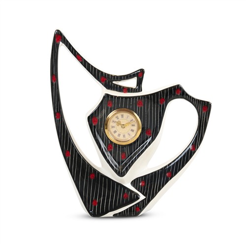 76 · A MODERN TABLE CLOCK IN A FREE-FORM GLAZED CERAMIC CASE 1960s, probably Italian Please see important information below regarding col...