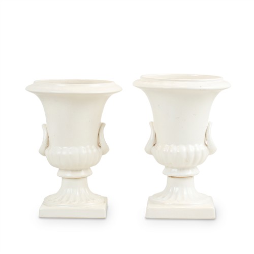 77 · A PAIR OF AUSTRALIAN MOONSTONE-GLAZED CAMPANA VASES Henning Rathjen, Melbourne, 1950s Please see important information below regardi...