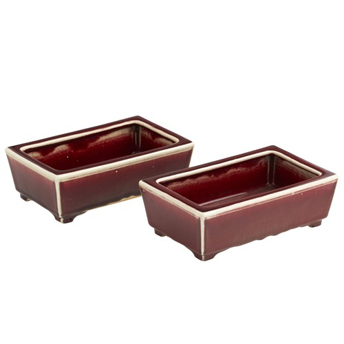 81 · A PAIR OF LANGYAO RED GLAZE RETANGULAR FLOWER POTS, QING DYNASTY (1644 - 1911)
