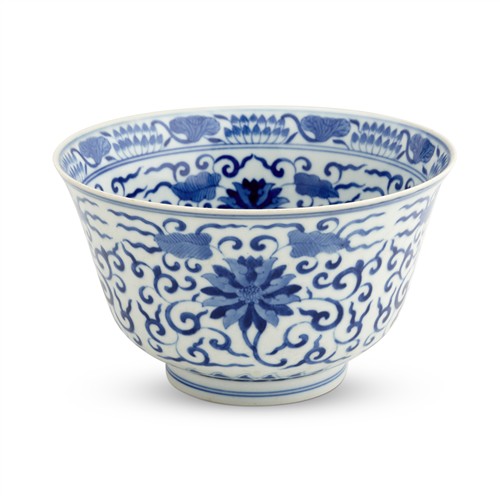 95 · A FINE AND LARGE CHINESE BLUE AND WHITE "FLORAL" BOWL, TONGZHI SIX-CHARACTER MARK IN UNDERGLAZE BLUE AND OF THE PERIOD (1862-1874)