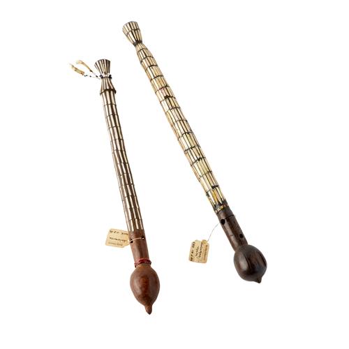 75 · TWO SOLOMON ISLANDS WOOD AND MOTHER OF PEARL DECORATED BATONS (MALA)
