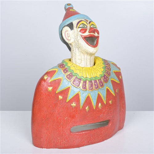A PAINTED FIBERGLASS SIDE SHOW CLOWN (73H X 58W X 30D CM)