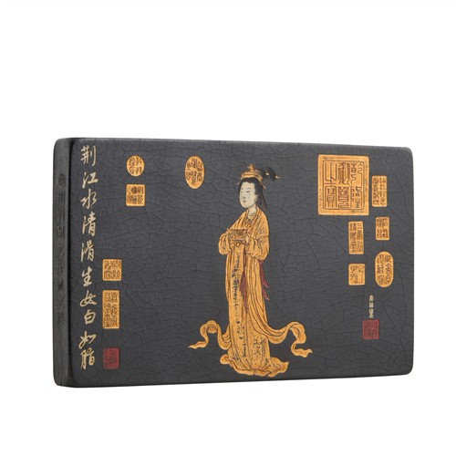 1064 · A LARGE CHINESE GOLD LACQUERED INK CAKE, 20TH CENTURY