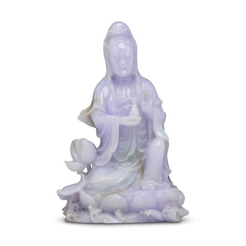 29 · A CHINESE LAVENDER JADEITE FIGURE OF GUANYIN