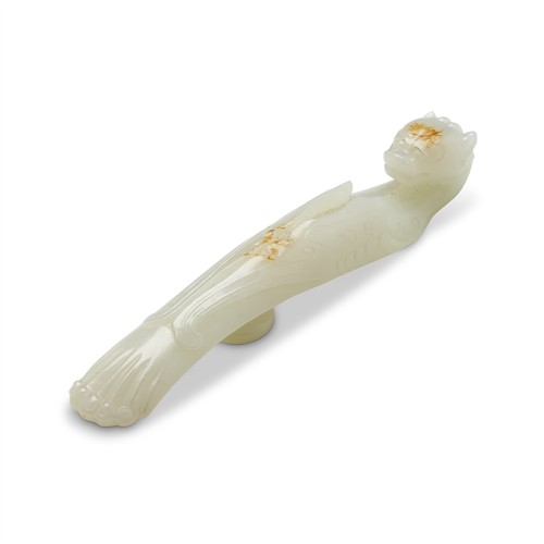 73 · A FINE CHINESE WHITE JADE 'DRAGON' BELT HOOK, QING DYNASTY (1644 - 1911)