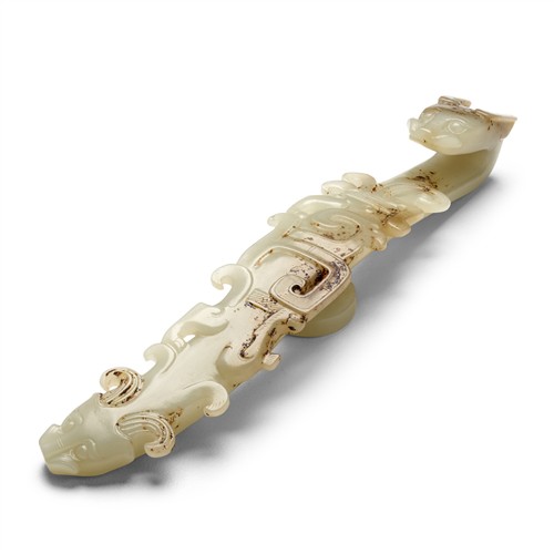 A Chinese White Jade Carved Dragon Belt Hook, Qing Dynasty (1644 - 1911)