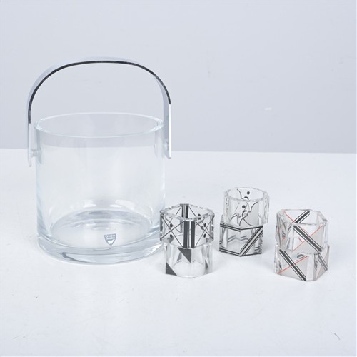 AN ORREFORS GLASS ICE BUCKET WITH SIX ART DECO GLASS NAPKIN RINGS