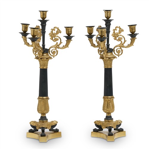 17 · A PAIR OF FRENCH RESTAURATION-STYLE GILT AND PATINATED BRONZE CANDELABRA Second half 20th century