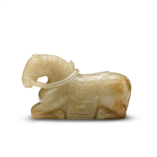 64 · A CHINESE CELADON AND RUSSET JADE HORSE, MING/QING DYNASTY, 17TH CENTURY