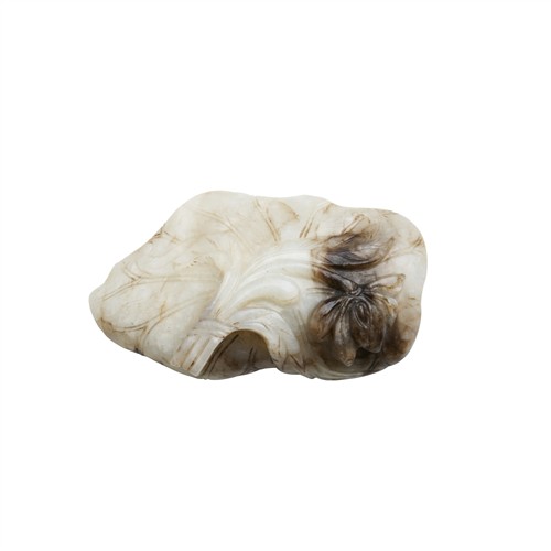 27 · A CHINESE GREY AND WHITE JADE CARVING OF LOTUS LEAF, QING DYNASTY (1644 - 1911)