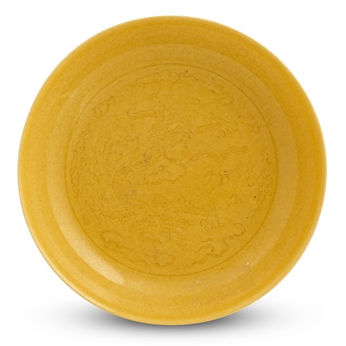 A CHINESE YELLOW GLAZED 'DRAGON' DISH, QIANLONG MARK
