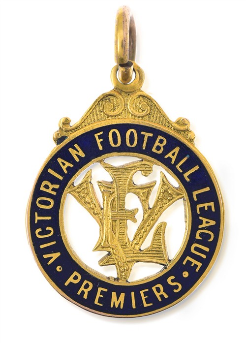 1054 · A 1939 MELBOURNE PREMIERSHIP MEDAL AWARDED TO RON BARASSI SNR