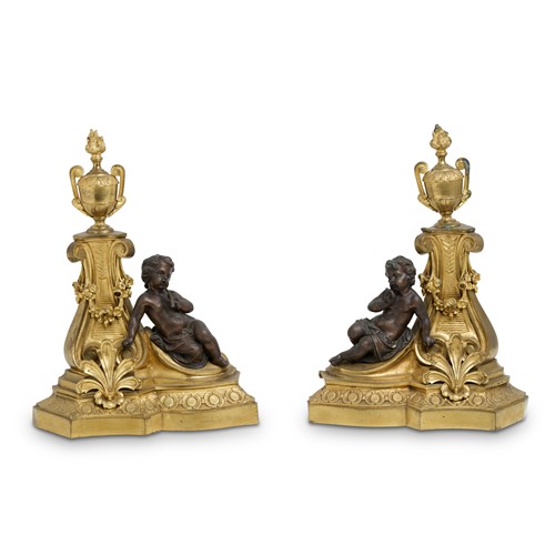 19 · A PAIR OF ANTIQUE FRENCH GILT AND PATINATED BRONZE HEARTH FENDER ENDS Late 19th century