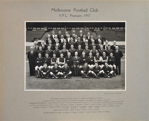 A 1957 MELBOURNE FOOTBALL CLUB TEAM PHOTOGRAPH AND GUERNSEY