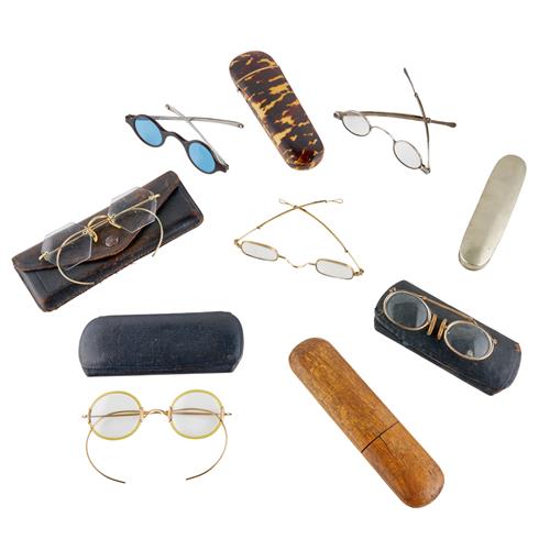 73 · A PAIR OF SILVER AND TORTOISESHELL SUN SPECTACLES, A GROUP OF FOUR CASED SPECTACLES, A PINCE-NEZ, AND A SPECTACLE CASE
