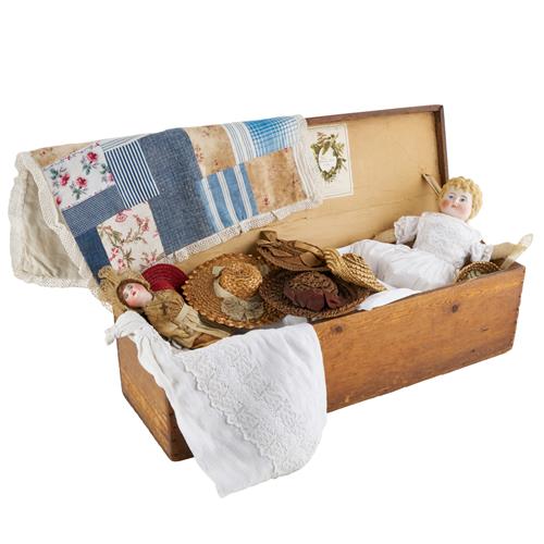53 · A COLLECTION OF EARLY PORCELAIN DOLLS AND DOLL CLOTHES