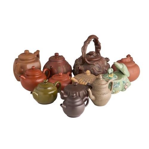 1069 · A COLLECTION OF 12 YIXING TEAPOTS