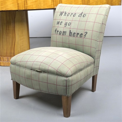 AN UPHOLSTERED CHAIR 'WHERE DO WE GO FROM HERE'