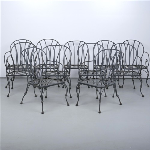 19 · A GROUP OF ELEVEN WROUGHT IRON ELBOW PATIO DINING CHAIRS, WITH EIGHT GREY CUSHIONS, GRAHAM GEDDES (97H X 56W X 65D CM)