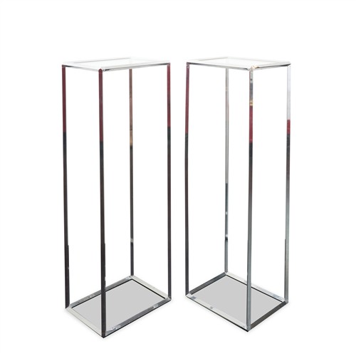 99 · A PAIR OF CONTEMPORARY CHROMED METAL STANDS Please see important information below regarding collection of lots in this auction.