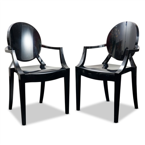 100 · A PAIR OF 'LOUIS GHOST' ELBOW CHAIRS IN BLACK ACRYLIC Philippe Starck for Kartell Please see important information below regarding c.