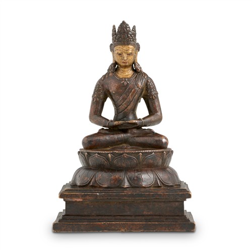 88 · A NEPALESE PARCEL-GILT SEATED FIGURE OF BUDDHA SHAKYAMUNI, POSSIBLY 11TH/12TH CENTURY