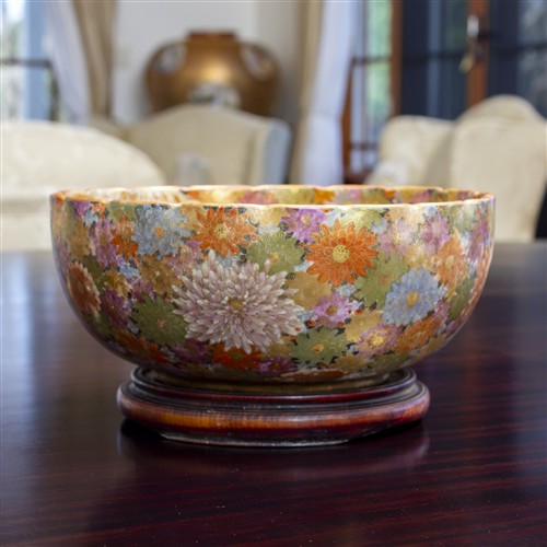 56 · A JAPANESE SATSUMA BOWL WITH FLUTED EDGES