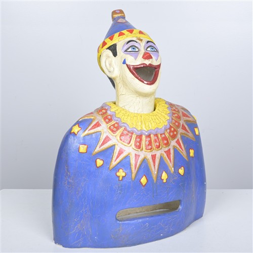 A PAINTED FIBERGLASS SIDE SHOW CLOWN (74H X 57W X 30D CM)