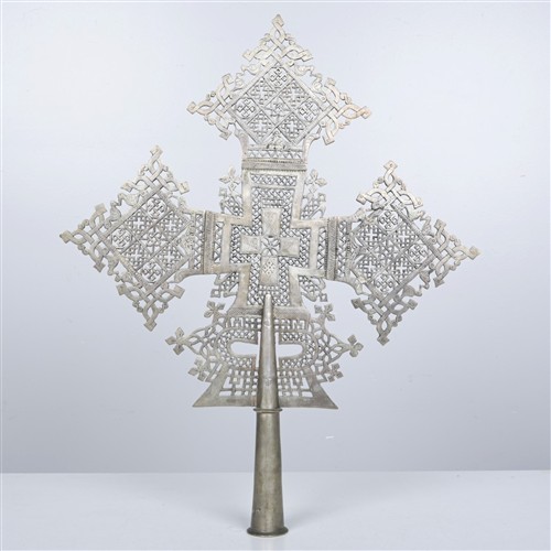 AN ETHIOPIAN PROCESSIONAL CROSS (77H X 63W CM)