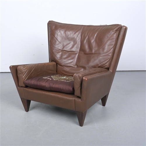 An Illum Wikkelso V11 Leather Upholstered Armchair (Lacking Seat Cushion) (85h X 90w X 90d Cm)
