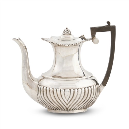 74 · A GEORGE V STERLING SILVER COFFEE POT George Nathan & Ridley Hayes, Chester, 1911
