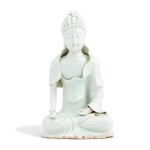 37 · A CHINESE QINGBAI GLAZED SEATED FIGURE OF BUDDHA SHAKYAMUNI, POSSIBLY YUAN DYNASTY OR LATER