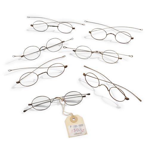 28 · SEVEN WIRE-FRAMED SPECTACLES