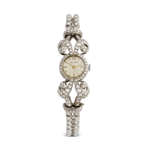 38 · PAUL BUHRE AN 18CT WHITE GOLD AND DIAMOND-SET COCKTAIL WATCH CIRCA 1950