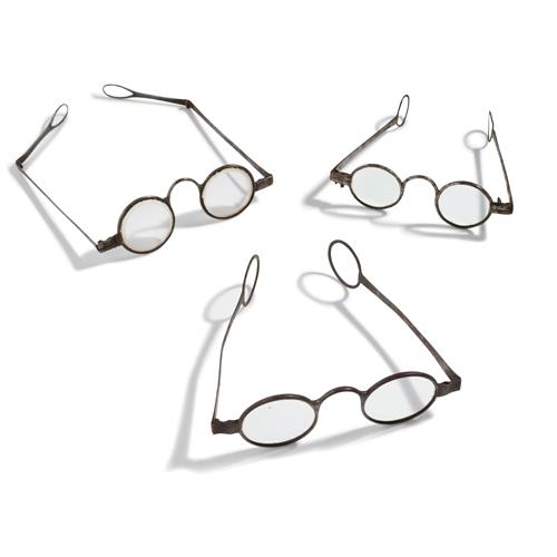53 · THREE IRON SPECTACLES