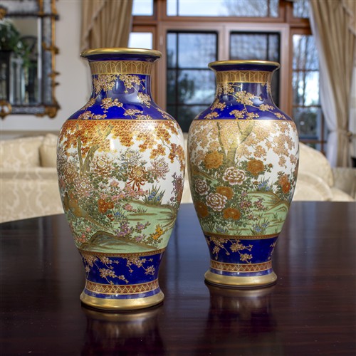 84 · A PAIR OF SATSUMA 'PEASANT' VASES