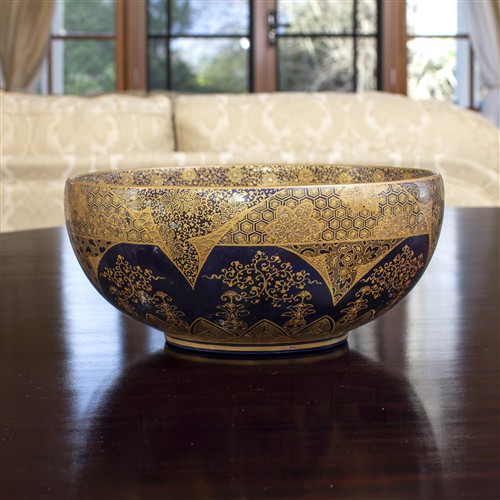 88 · A SATSUMA BOWL DEPICTING FIGURES IN A LANDSCAPE