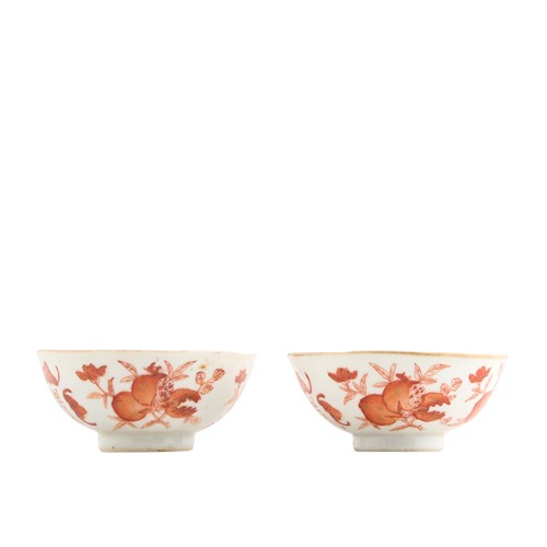 1087 · A PAIR OF CHINESE IRON-RED DECORATED "SANDUO" BOWLS, QIANLONG FOUR-CHARACTER IRON-RED SEAL MARK AND OF THE PERIOD (1736 - 1796)