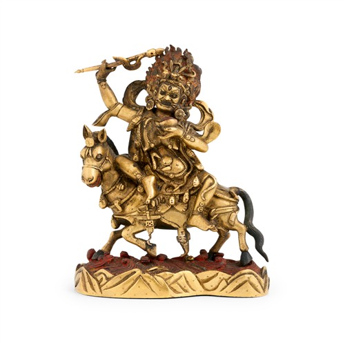 82 · A TIBETAN GILT-BRONZE FIGURE OF PALDEN LHAMO, 18TH CENTURY