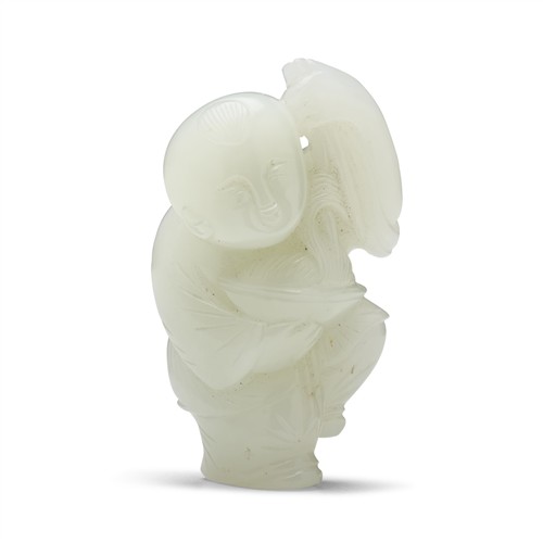 70 · A CHINESE WHITE JADE CARVED BOY, QING DYNASTY (1644 - 1911)