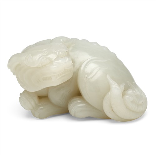 87 · A FINE CHINESE WHITE JADE LION, QING DYNASTY (1644 - 1911)