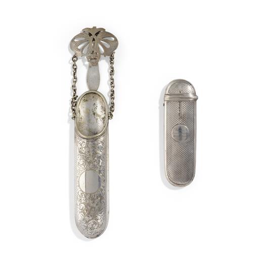 69 · A VICTORIAN SILVER LENS CASE AND SILVER PLATED CHATELAINE