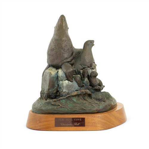 72 · Christopher Wayne BELL (1948–1998) 'Fur seal cove' Bronze, mounted on a shaped hardwood base 34cm high, 35cm wide, 24.5cm deep