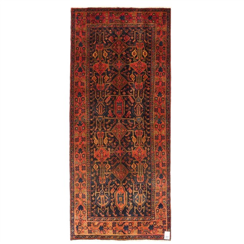 28 · A VEGETABLE-DYE PERSIAN LURI ENTRANCE RUG (320L X 135W CM)