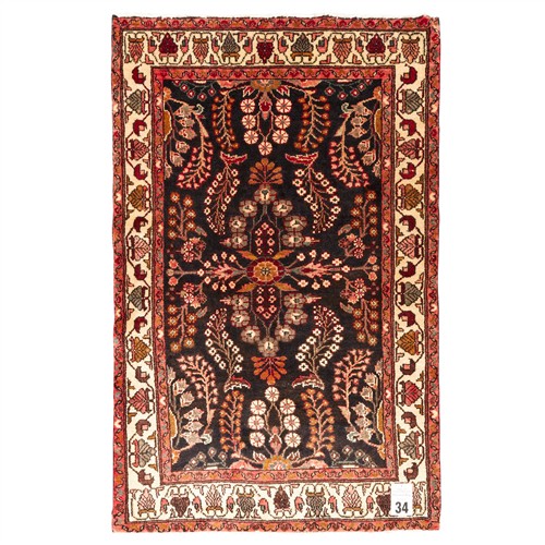 34 · A HAND-KNOTTED PERSIAN SAVEH RUG (170L X 110W CM)
