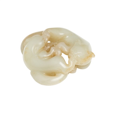 A CHINESE CELADON JADE CARVING OF TWO BADGERS, QING DYNASTY (1644 - 1911)