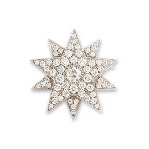 16 · A.E. KOCHERT, 18CT WHITE GOLD AND DIAMOND STAR BROOCH